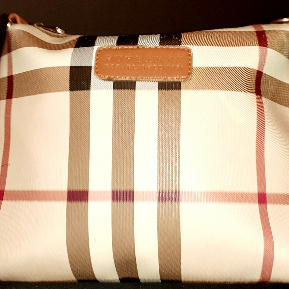 Burberry medium crossbody bag or lrg make up bag